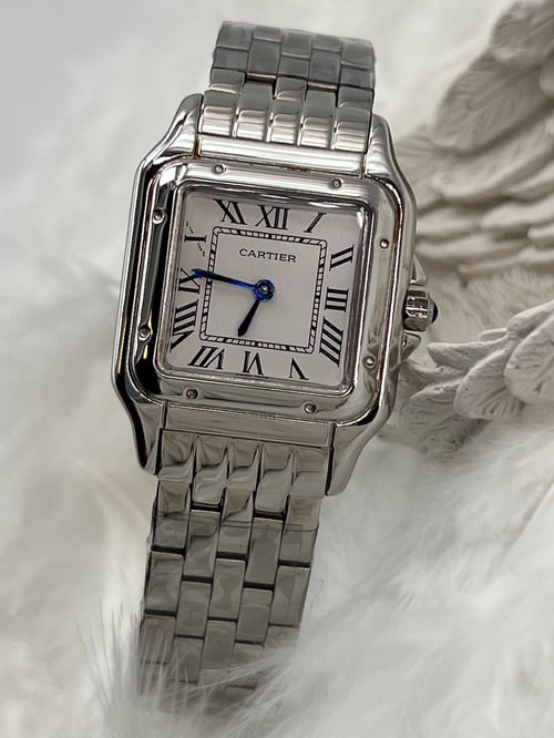 Cartier watch with sapphire shop