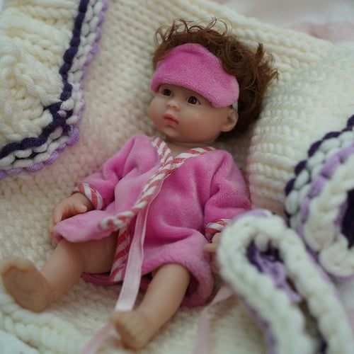 Baby doll with clothes to change clearance
