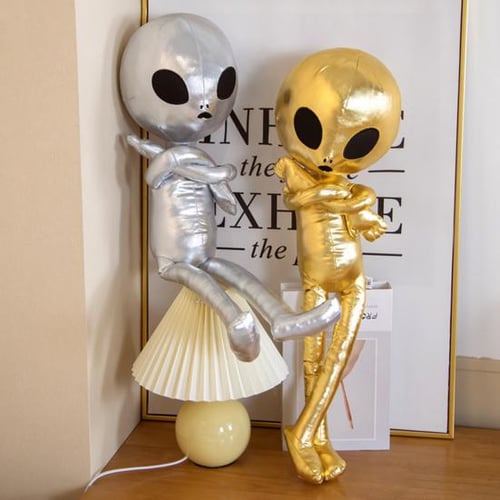 Stuffed alien on sale doll