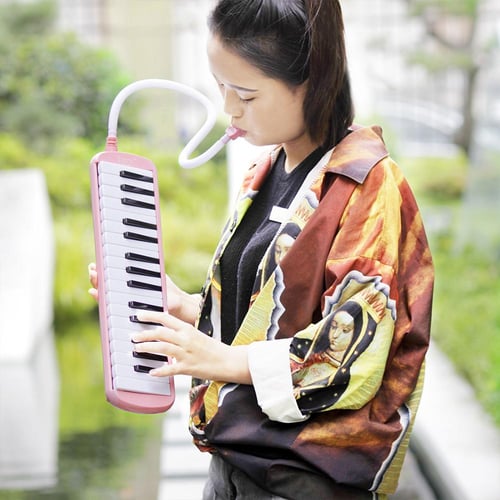 Keyboard with tube in mouth cheap